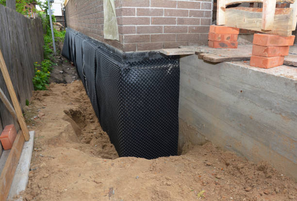 Happy homeowners after waterproofing job in Fairland